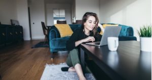 Woman using computer at home