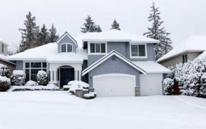 house in winter with snow