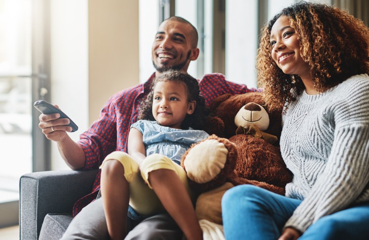 happy family watching tv