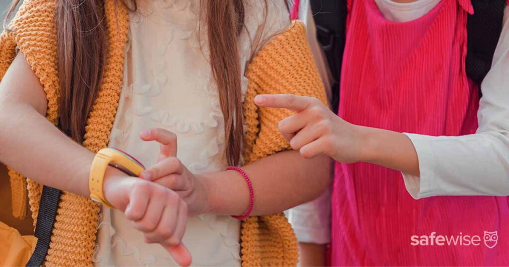 featured girls looking at watch face