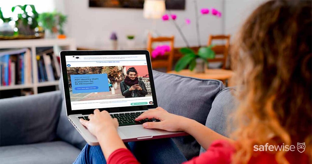 person-using-computer-with-adt-identity-theft-screen