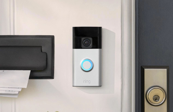 The new Ring Video Doorbell installed beside a door.