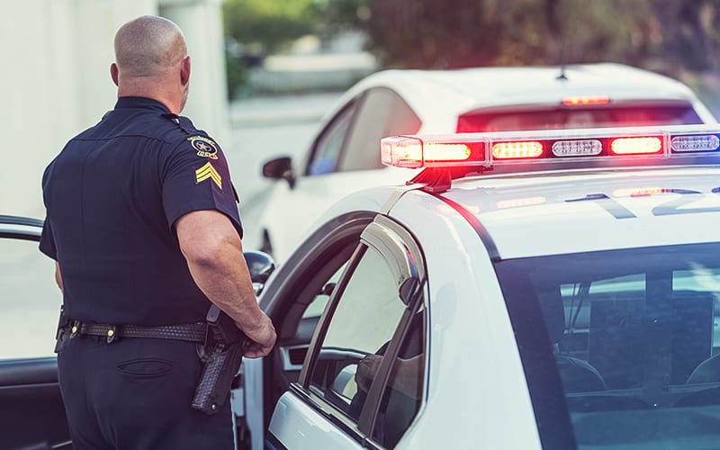 photo of officer pulling over driver